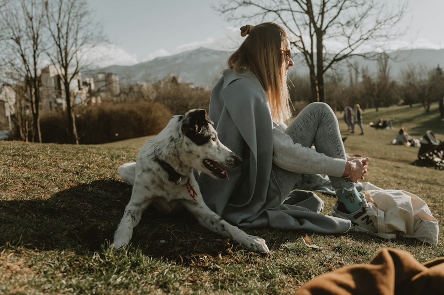 Owner enjoying carefree time outdoors with their dog